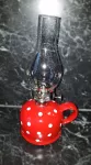 Petrolejová lampa červená s puntíky